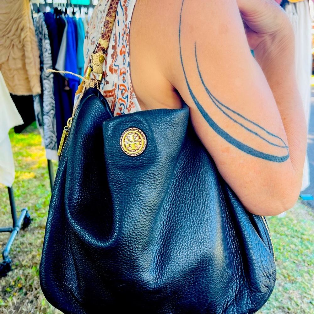 Tori Burch fantastic black leather and snake skin, expandable purse.